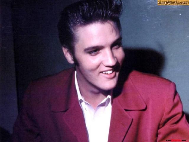 Elvis in dark red suite coat
