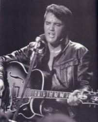 Elvis playing guitar
