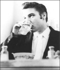 Elvis Presley drinking water
