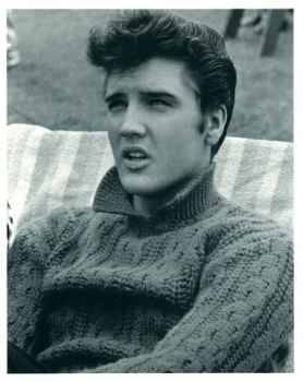 Elvis Presley in a sweater
