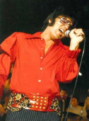 Elvis Presley in black and red
