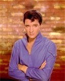 Elvis Presley in purple shirt
