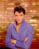 Elvis Presley in purple shirt