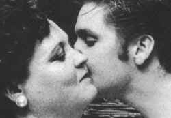 Elvis Presley kissing his mom
