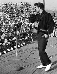Elvis Presley on stage_in white shoes
