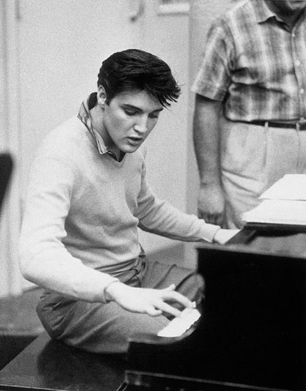 Elvis Presley playing piano
