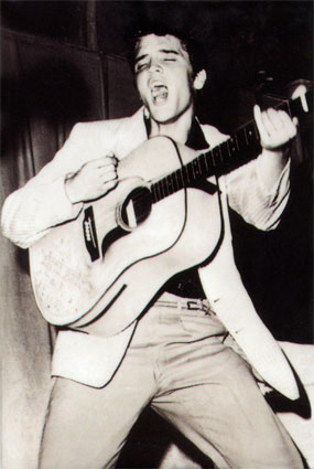 Elvis Presley singing poster
