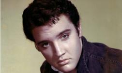 Elvis Presley wearing black jean jacket