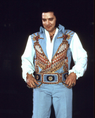 Elvis Presley wearing in white and blue
