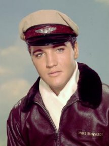 Elvis Presley wearing pilot outfit
