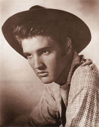 Elvis Presley with farm outfit
