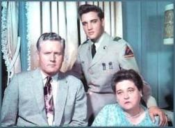 Elvis Presley with his mom and dad
