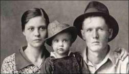 Elvis Presley with his parents
