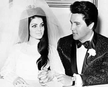 Elvis Presley with his wife at their wedding
