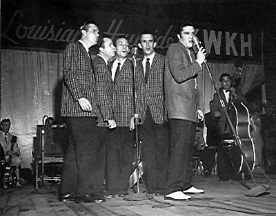 Elvis singing with band
