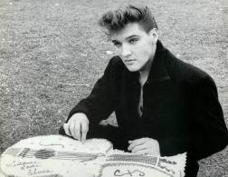 Elvis with a paper guitar
