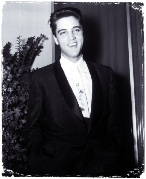 Elvis with his cut smile
