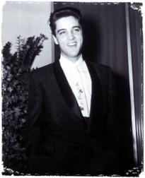 Elvis with his cut smile